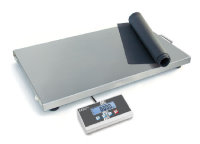 Stainless steel platform scale with rubber mat for animal weighing sitting on a white background