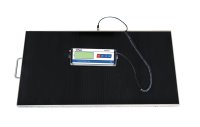 Platform scale with rubber mat and digital display on it pictured on a white background