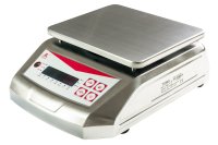 Silver grey red and white bench scales sitting on a white background
