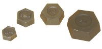 four hexagonal brass coloured weights pictured on a white background