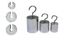 Picture of three slotted weights in a line next to 3 hooked weights also in a line on a white background