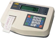 Large cream weighing indicator showing printer function with printed paper also visible