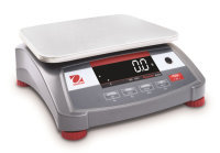 Grey and stainless steel OHAUS bench scale sitting on a white background