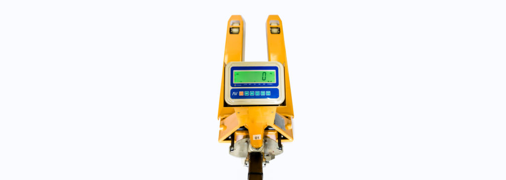 IMage of yellow pallet truck weighing scales on a white background